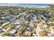 Expansive aerial view of a residential neighborhood with lush green landscaping, with some homes featuring private pools at 7507 3Rd Nw Ave, Bradenton, FL 34209