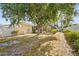 Spacious backyard with a screened enclosure, perfect for outdoor entertaining and relaxation at 7507 3Rd Nw Ave, Bradenton, FL 34209