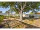 Large backyard with a mature tree providing plenty of shade, great for outdoor activities at 7507 3Rd Nw Ave, Bradenton, FL 34209