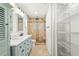 Updated bathroom with double sinks, and a stone shower at 7507 3Rd Nw Ave, Bradenton, FL 34209