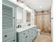 Updated bathroom with double sinks and a stone shower at 7507 3Rd Nw Ave, Bradenton, FL 34209