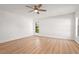 Empty bedroom boasts wood-look flooring and a ceiling fan at 7507 3Rd Nw Ave, Bradenton, FL 34209