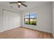 Bedroom with new flooring, closet, and a window providing plenty of sunlight at 7507 3Rd Nw Ave, Bradenton, FL 34209