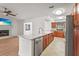 Modern kitchen featuring granite countertops, stainless steel appliances, and an open layout design at 7507 3Rd Nw Ave, Bradenton, FL 34209
