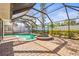 Screened in pool with spa and brick paver patio at 7507 3Rd Nw Ave, Bradenton, FL 34209