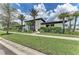 Beautiful community building featuring lush landscaping and modern architecture at 9048 Bernini Pl, Sarasota, FL 34240