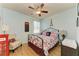 A decorated bedroom with a vintage telephone and a telephone box table at 11306 77Th E St, Parrish, FL 34219