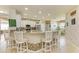 Modern kitchen with white cabinetry, granite countertops, and stainless steel appliances at 11306 77Th E St, Parrish, FL 34219