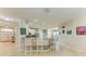 Stylish kitchen with granite countertops and modern appliances, ideal for culinary enthusiasts at 11306 77Th E St, Parrish, FL 34219