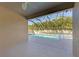 A screened-in pool area featuring a swimming pool and a jacuzzi, perfect for relaxation and entertainment at 11306 77Th E St, Parrish, FL 34219