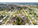 Aerial view of a residential area close to the ocean with neatly lined street and similarly sized properties at 2721 12Th St, Englewood, FL 34224