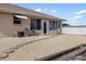 Backyard view of this home, landscaped with decorative stone, stepping stones and views of the canal at 2721 12Th St, Englewood, FL 34224