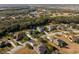 Wide aerial view of the community surrounded by lush greenery and waterways at 3407 155Th E Ave, Parrish, FL 34219