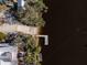 Aerial view of a home's private boat dock and boat launch on the water at 3407 155Th E Ave, Parrish, FL 34219