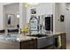 Kitchen island featuring stainless steel sink, granite countertop, and stainless steel appliances at 3407 155Th E Ave, Parrish, FL 34219