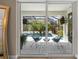 View of the screened lanai with pool beyond the sliding glass doors at 3407 155Th E Ave, Parrish, FL 34219