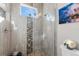 Modern shower boasting decorative tiles, glass enclosure, and convenient shower fixtures at 3407 155Th E Ave, Parrish, FL 34219