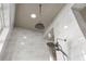 Modern bathroom with dual shower heads and light marble throughout at 3407 155Th E Ave, Parrish, FL 34219
