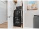 View of small storage room for media equipment and white doors with chrome handles at 3407 155Th E Ave, Parrish, FL 34219