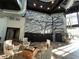Indoor rock climbing wall with seating area, providing a recreational space in the community clubhouse at 10109 Milky Way Cir, Sarasota, FL 34241