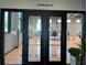 Community gymnasium with basketball court, hardwood floors, and natural light streaming through the windows at 10109 Milky Way Cir, Sarasota, FL 34241