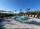 Inviting hot tub featuring lounge chairs and patio furniture for outdoor relaxation at 10109 Milky Way Cir, Sarasota, FL 34241