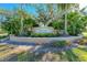 Stonebrook community entrance surrounded by manicured landscaping and mature trees at 223 Heritage Isles Way, Bradenton, FL 34212