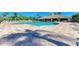 The community pool and seating area on a beautiful day at 223 Heritage Isles Way, Bradenton, FL 34212