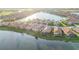 Waterfront homes boast tile roofs and beautiful landscaping in this stunning community at 23703 Waverly Cir, Venice, FL 34293