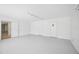 Unfinished basement featuring neutral colors, storage space, and lighting at 2458 Whippoorwill Cir, Sarasota, FL 34231