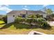 Attractive single-Gathering home with well-maintained lawn and lush landscaping at 2458 Whippoorwill Cir, Sarasota, FL 34231