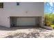 Two-car garage is accessible from a brick paved driveway at 2458 Whippoorwill Cir, Sarasota, FL 34231