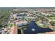 Beautiful aerial shot of condo community with lush greenery, tranquil pond, and community pool at 400 San Lino Cir # 431, Venice, FL 34292