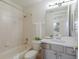 Cozy secondary bathroom with a combined bathtub and shower, complemented by a neutral-toned vanity at 6409 Moorings Point Cir # 102, Lakewood Ranch, FL 34202