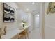 Bright hallway with stylish decor, built-in cabinets, and a modern desk area at 6409 Moorings Point Cir # 102, Lakewood Ranch, FL 34202