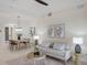 Bright living room featuring comfortable seating and stylish decor creating an inviting space at 6409 Moorings Point Cir # 102, Lakewood Ranch, FL 34202