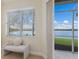Bright bedroom with lake view, and stylish furniture at 6409 Moorings Point Cir # 102, Lakewood Ranch, FL 34202