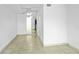 Spacious bedroom with tiled floors, neutral paint, and natural light at 1226 Coral Ridge Dr, Punta Gorda, FL 33950
