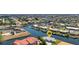 Aerial view of the property highlighting its waterfront location, landscaping, and community setting at 1327 Wesley Dr, Punta Gorda, FL 33950