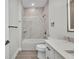 Beautiful bathroom features a luxurious tub with sleek marble-look surround and modern fixtures at 1327 Wesley Dr, Punta Gorda, FL 33950
