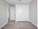 Well-lit bedroom features tile flooring, base trim, and neutral paint at 1327 Wesley Dr, Punta Gorda, FL 33950
