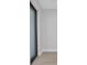 Clean design, with wood-style flooring, white trim, and neutral walls create a bright bedroom space at 1327 Wesley Dr, Punta Gorda, FL 33950