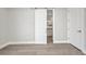 Bedroom view of the barn door to closet, hardwood floors and fresh paint at 1327 Wesley Dr, Punta Gorda, FL 33950