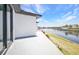 Exterior view of the waterfront home with patio area at 1327 Wesley Dr, Punta Gorda, FL 33950