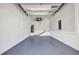 Spacious, clean garage with ample storage space and epoxy flooring at 1327 Wesley Dr, Punta Gorda, FL 33950