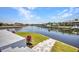 Beautiful waterfront view of the canal, showcasing the home's proximity to the water and boating opportunities at 1327 Wesley Dr, Punta Gorda, FL 33950