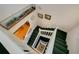 Carpeted staircase with white railings at 145 Burns Rd, Terra Ceia, FL 34250