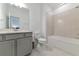 Clean bathroom featuring a vanity with modern fixtures, a toilet, and a tiled shower-tub combo at 2930 61St E Dr, Ellenton, FL 34222