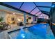 View of screened pool and backyard living space featuring multiple seating areas at 2930 61St E Dr, Ellenton, FL 34222