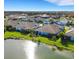 Aerial view of a home in a lakeside community at 3325 Azurite Way, Bradenton, FL 34211